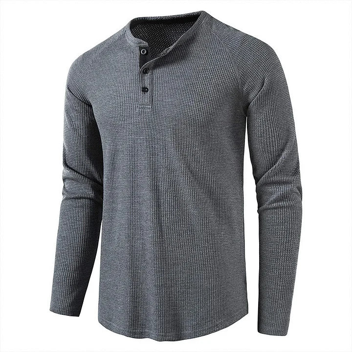 Graues Herren-Henley-Shirt mit langen Ärmeln und Knopfleiste, aus Baumwollmischung. Ideal für Freizeitmode und Herbstkleidung.