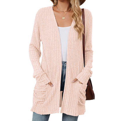 Women's knitted jacket with long sleeves, plain, with pockets