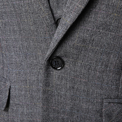 Grauer kariertes Sakko mit Knopfverschluss, elegantes Herrenjackett aus hochwertigem Stoff, ideal für formelle Anlässe und Business-Mode.