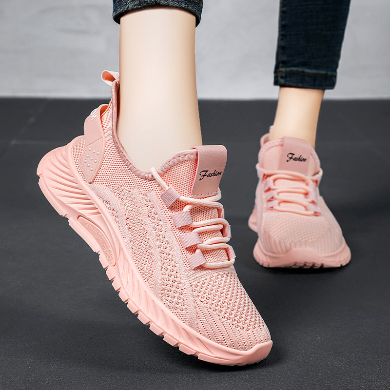 Women's lace-up running sneakers with flat sole and breathable upper