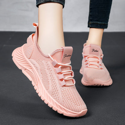 Women's lace-up running sneakers with flat sole and breathable upper