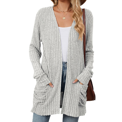 Women's knitted jacket with long sleeves, plain, with pockets