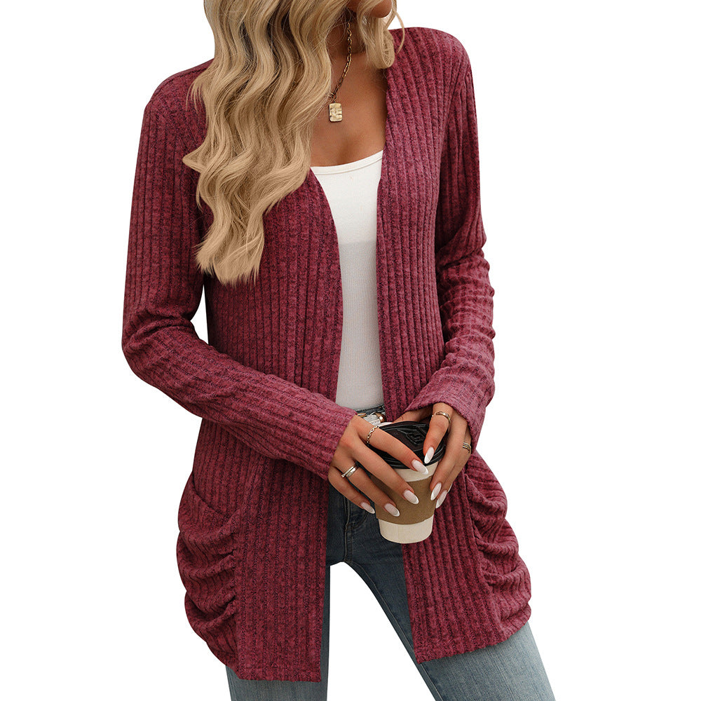 Women's knitted jacket with long sleeves, plain, with pockets