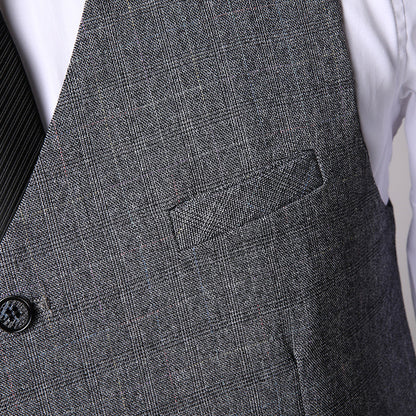 Graue karierte Herrenweste mit Knopf und Brusttasche, elegantes Design, ideal für formelle Anlässe. Hochwertige Herrenmode.