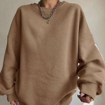 Women's top with print, round neckline, and long sleeves, loose fit