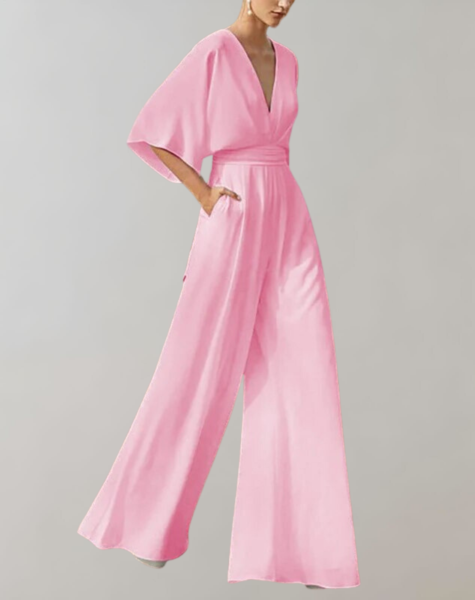 Eleganter rosa Jumpsuit mit weitem Bein und tiefem V-Ausschnitt, ideal für Damenmode, Abendveranstaltungen und stilvolle Outfits.