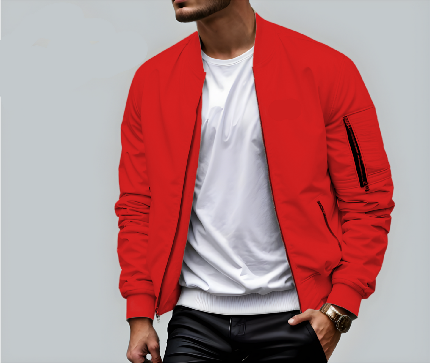 Mann in roter Bomberjacke, weißem T-Shirt und schwarzer Hose. Modetrend, lässiger Stil, Herrenmode, Streetwear, stilvolle Kleidung.