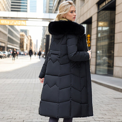 Women's long winter coat with faux fur collar and quilted design