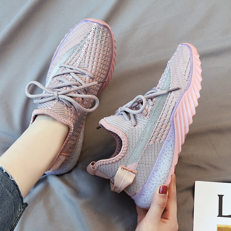 Women's wedge sneaker with rounded toe and flat shaft – knit look
