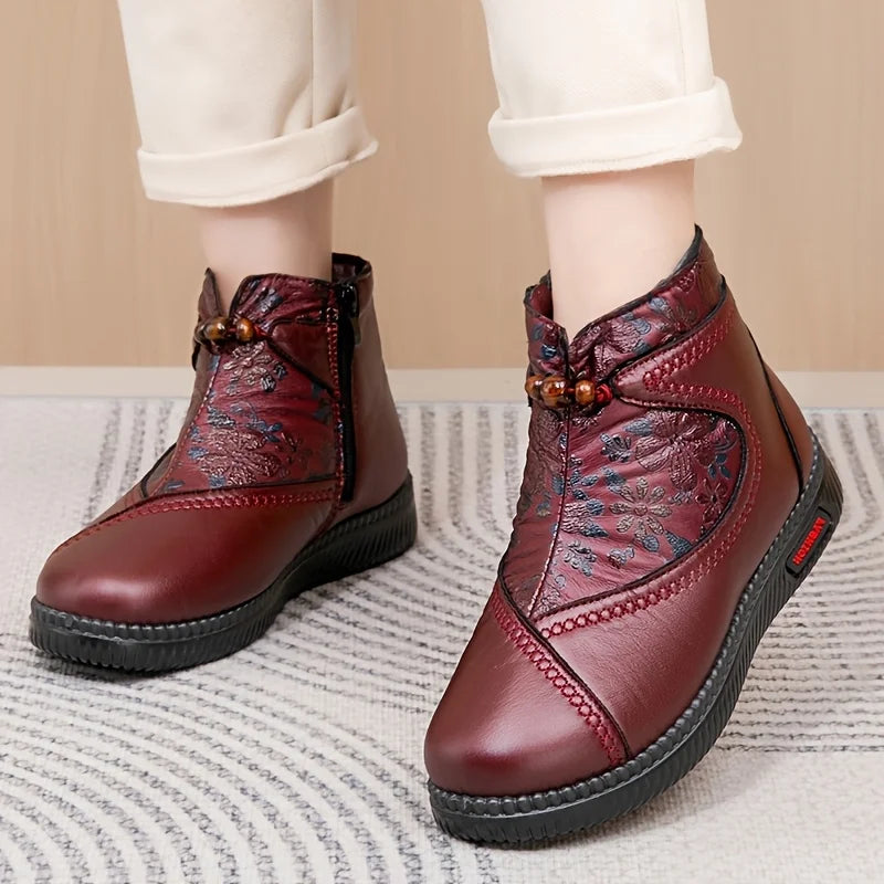 Women's ankle boots with floral embossing and side zipper