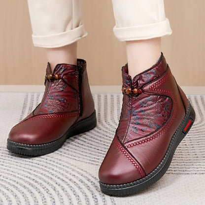 Women's ankle boots with floral embossing and side zipper