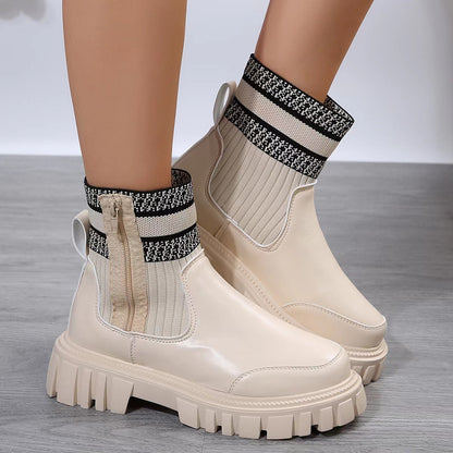 Women's winter boots with mid-calf shaft and side zipper