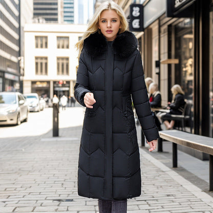 Women's long winter coat with faux fur collar and quilted design