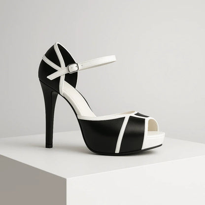 Women's platform stiletto heels with ankle strap and geometric panel design