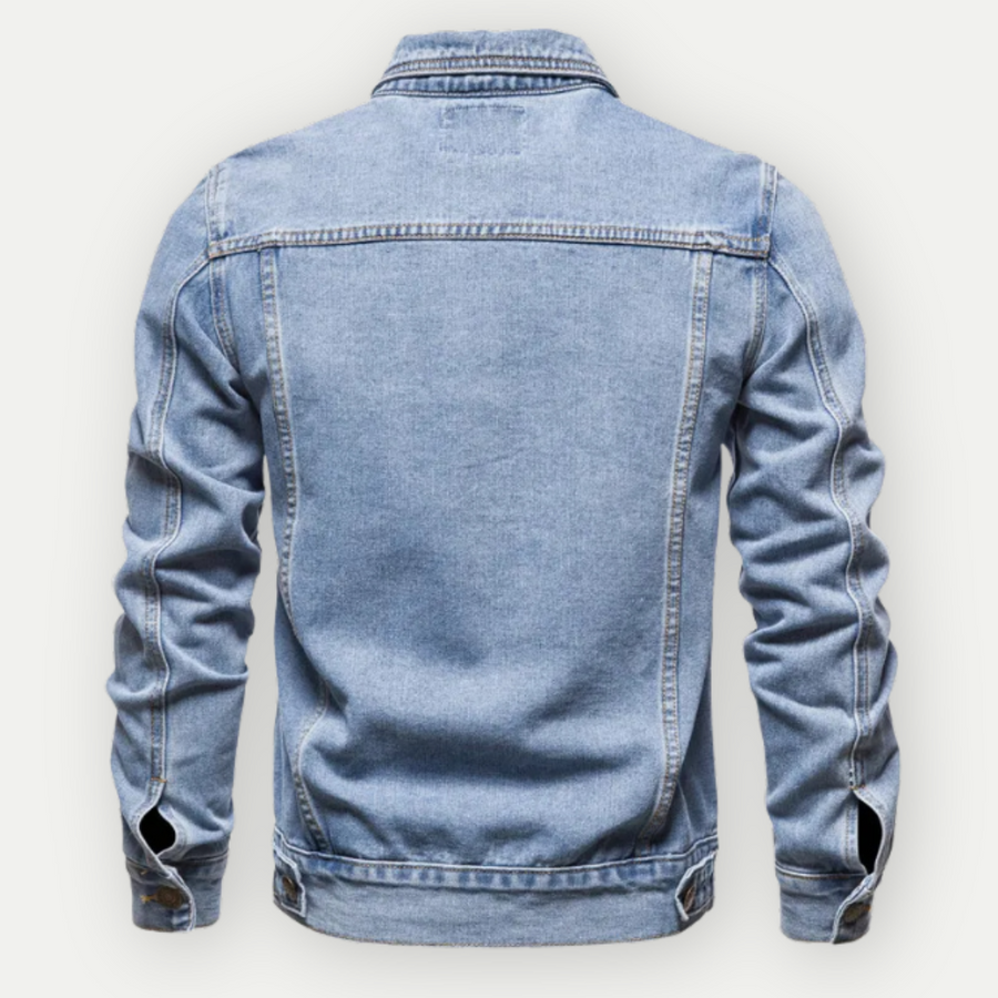 Rückansicht einer klassischen blauen Jeansjacke aus Denim, langärmlig, mit Knöpfen und Nähten, ideal für modische Freizeitoutfits.