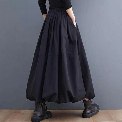 Women's solid color A-line skirt with layered design
