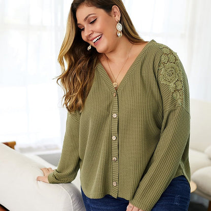 Women's knitted sweater with V-neck, long sleeves, and button details