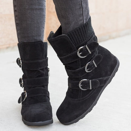Women's winter boots with round toe, flat heel, and strap-buckle design