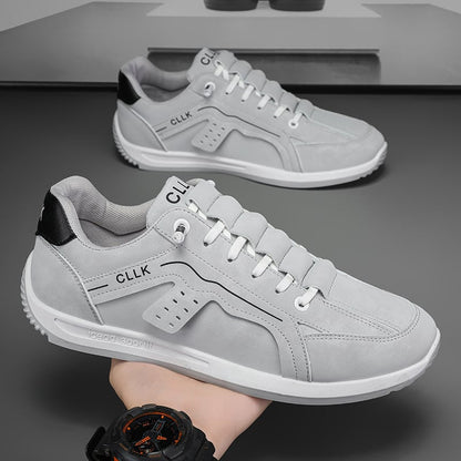 Men's skate shoes with laces, flat sole, and rounded toe cap