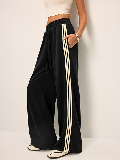 Damen Sweatpants mit weitem Bein und seitlichem Streifen, mittelhoher Bund, elastischer Taillenbund