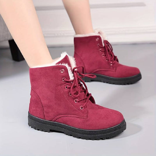 Rote Damen-Winterstiefel mit Schnürung und Fellfutter, rutschfeste Sohle, modisch und warm, ideal für kalte Tage.