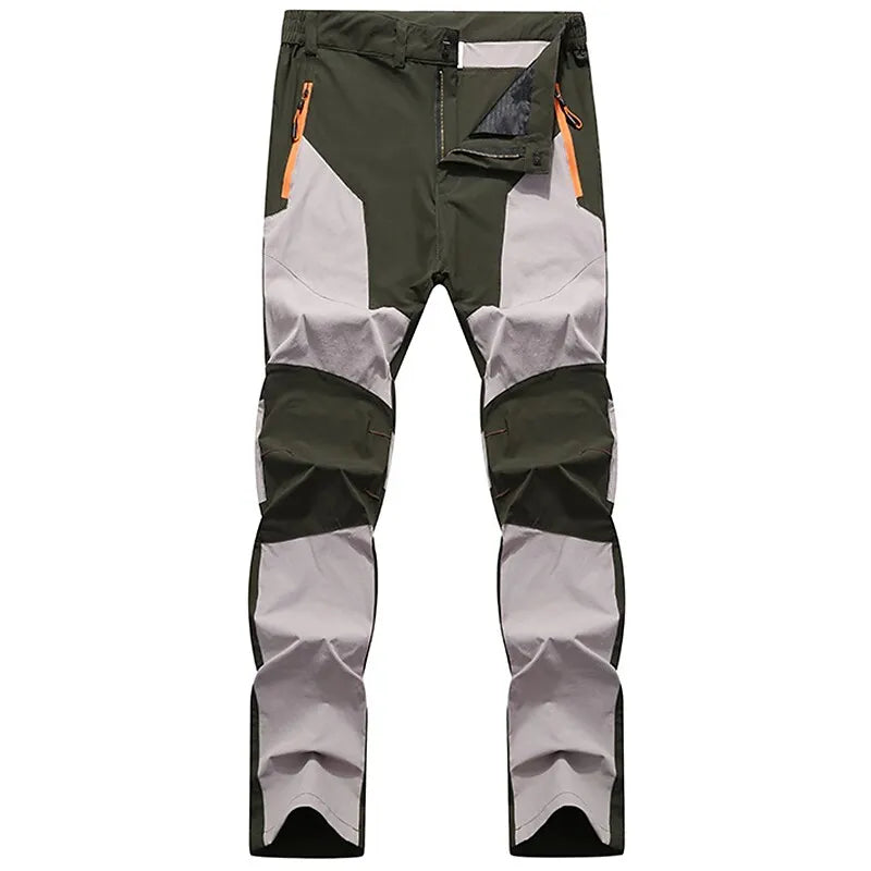Grüne und graue Outdoor-Hose mit Reißverschlusstaschen, strapazierfähigem Material, ideal für Wandern und Trekking. Herrenbekleidung, funktional.
