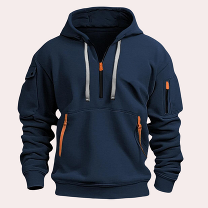 Dunkelblauer Hoodie mit Kapuze, Reißverschlüssen und Taschen. Modischer Herrenpullover, ideal für Freizeit und Sport. Bequeme Streetwear.