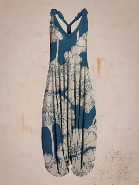 Blaues ärmelloses Kleid mit weißem Blumenmuster, lässiger Stil, ideal für Sommermode und Freizeitkleidung. Hochwertiger Stoff, modisches Design.
