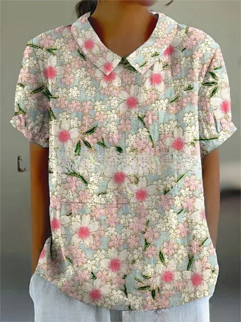 Damenbluse mit Blumenmuster, kurzärmelig, Kragen, pastellfarbene Blumen, lässiger Stil, ideal für Sommermode, modisches Design.