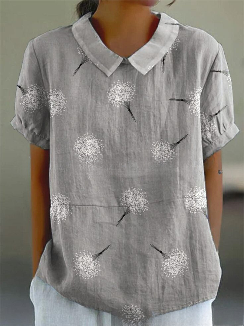 Graues Damenhemd mit Löwenzahn-Muster, Kurzarm, lässiger Stil, Baumwollstoff, modisches Design, ideal für Sommermode und Freizeitkleidung.