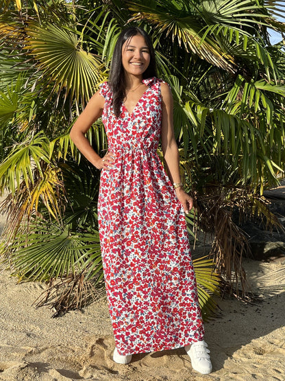 Long women's dress with floral pattern, short sleeves, and shoulder knot in one size