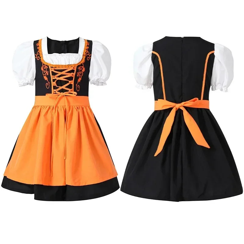 Schwarzes und orangefarbenes Dirndl-Kleid für Mädchen, mit weißer Bluse, Schnürung vorne und Schleife hinten. Traditionelle bayerische Tracht.