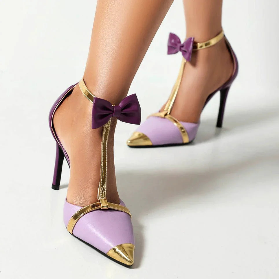 Women's high heels with pointed toe, T-strap, and golden accents
