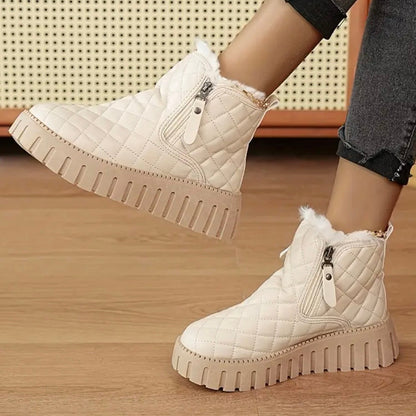 Women's winter boots with quilted upper material and side zipper