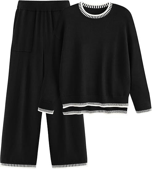 Schwarzer Damen-Pullover und Hose Set mit weißen Streifen, gemütliche Freizeitmode, elegantes Design, ideal für Herbst und Winter.