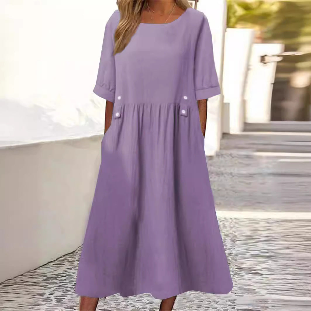 Lila Sommerkleid mit halblangen Ärmeln und Taschen, ideal für Damenmode. Perfekt für lässige Anlässe und stilvolle Sommeroutfits.