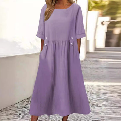 Lila Sommerkleid mit halblangen Ärmeln und Taschen, ideal für Damenmode. Perfekt für lässige Anlässe und stilvolle Sommeroutfits.