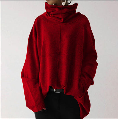 Roter Oversize-Pullover mit Rollkragen, lässig geschnitten, aus weichem Stoff. Perfekt für Herbstmode und gemütliche Outfits.
