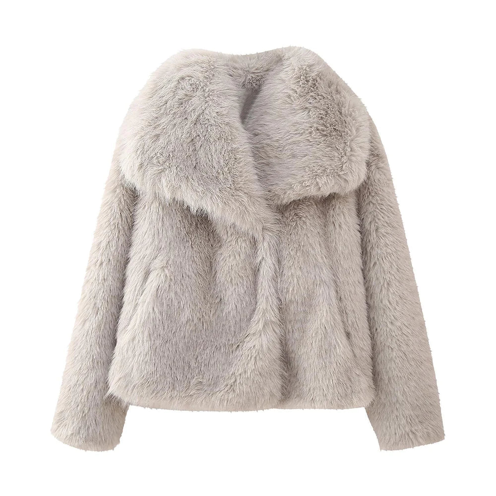 Grauer Kunstpelzmantel für Damen, flauschig und stilvoll, ideal für Wintermode. Eleganter Look, warmes Material, modisches Design.