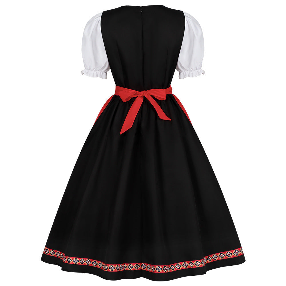 Damen-Dirndl mit kurzen Puffärmeln und klassischer Schürze