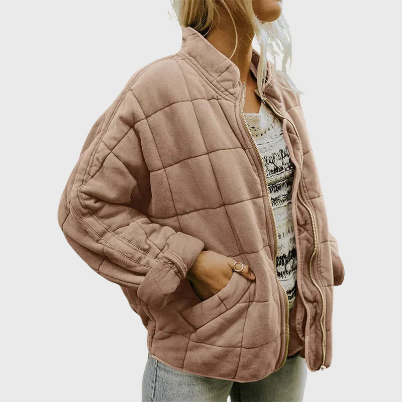 Damen Winterjacke in Rosa, gesteppt, mit Reißverschluss und Taschen. Modische, warme Jacke für kalte Tage. Ideal für Herbst und Winter.