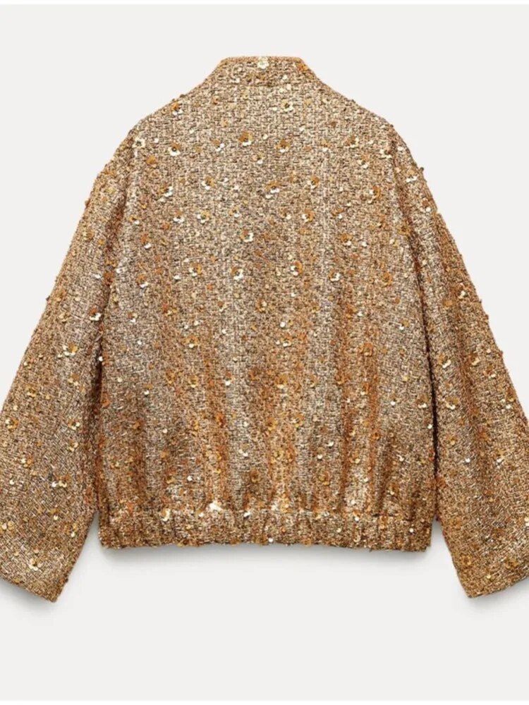 Goldene Paillettenjacke, Rückansicht. Glitzernde, elegante Damenjacke mit langen Ärmeln, ideal für festliche Anlässe und modische Outfits.