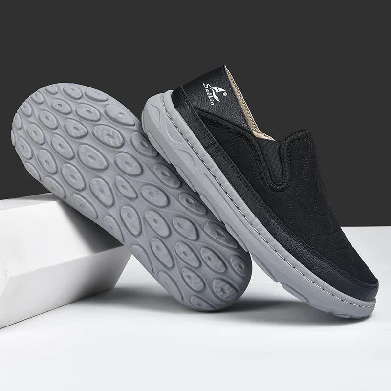 Herren Slipper mit Stepp-Obermaterial, Elastikeinsätzen und flexibler Sohle