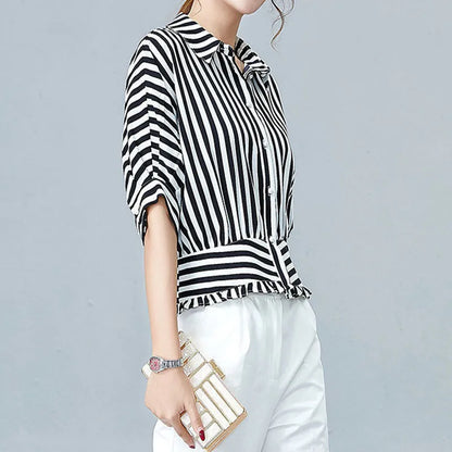 Women's striped top with concealed button placket and bell cuffs
