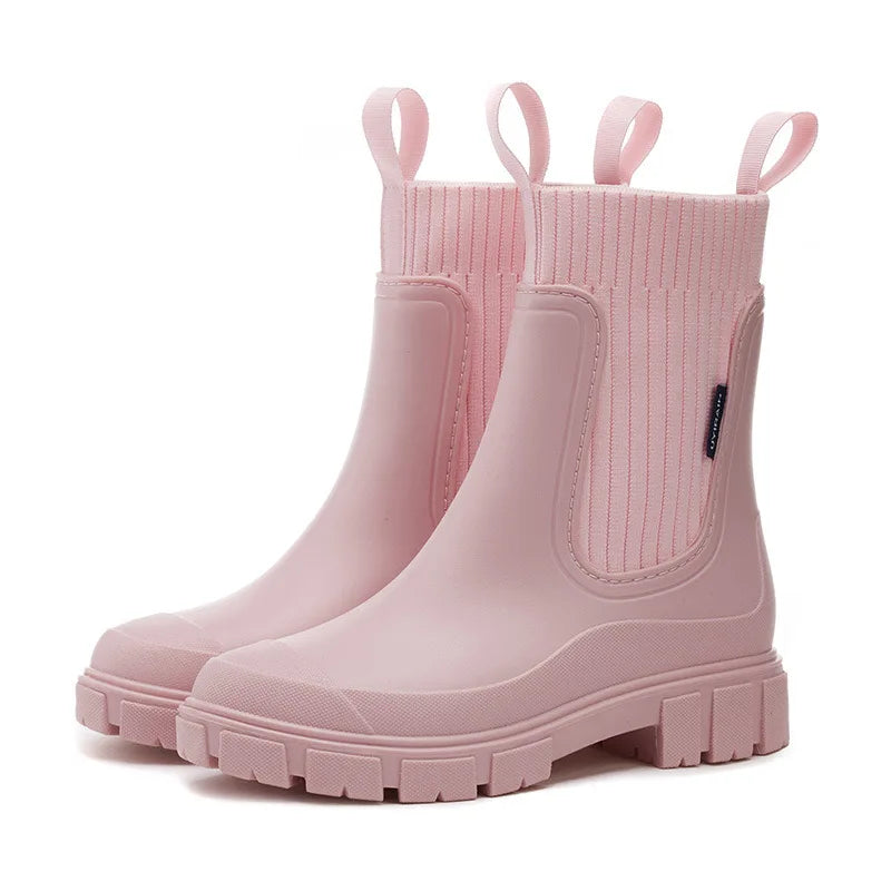 Rosa Gummistiefel mit dicker Sohle und elastischem Schaft, modisch und wasserdicht, ideal für Regenwetter und Outdoor-Aktivitäten.