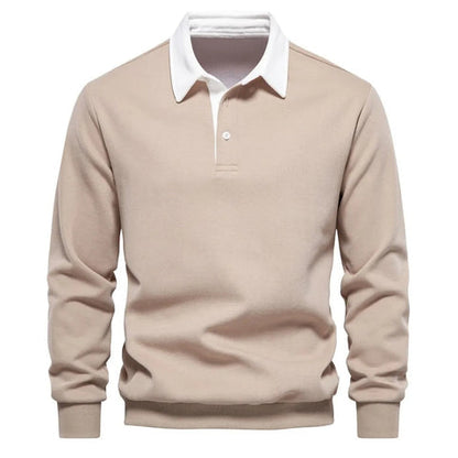 Beiges Herren-Poloshirt mit weißem Kragen, langärmelig, klassisches Design, ideal für Freizeit- und Business-Looks. Hochwertige Baumwollmischung.