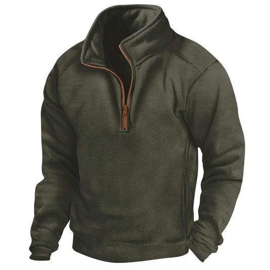 Dunkelgrüner Fleece-Pullover mit Reißverschluss, Stehkragen und langen Ärmeln. Ideal für Outdoor-Aktivitäten und kaltes Wetter.