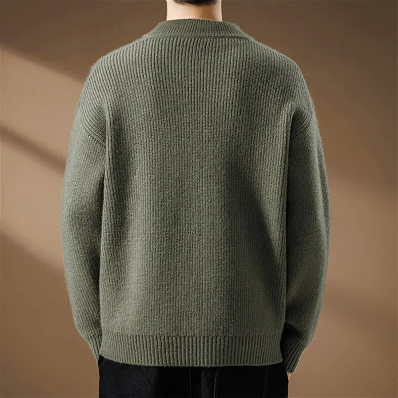 Men's knitted sweater with Henley collar, cable pattern, and chest pocket
