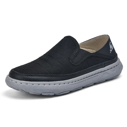 Herren Slipper mit Stepp-Obermaterial, Elastikeinsätzen und flexibler Sohle