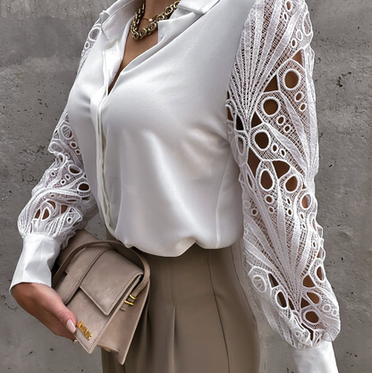 Women's blouse with textured collar, loose fit, and button placket